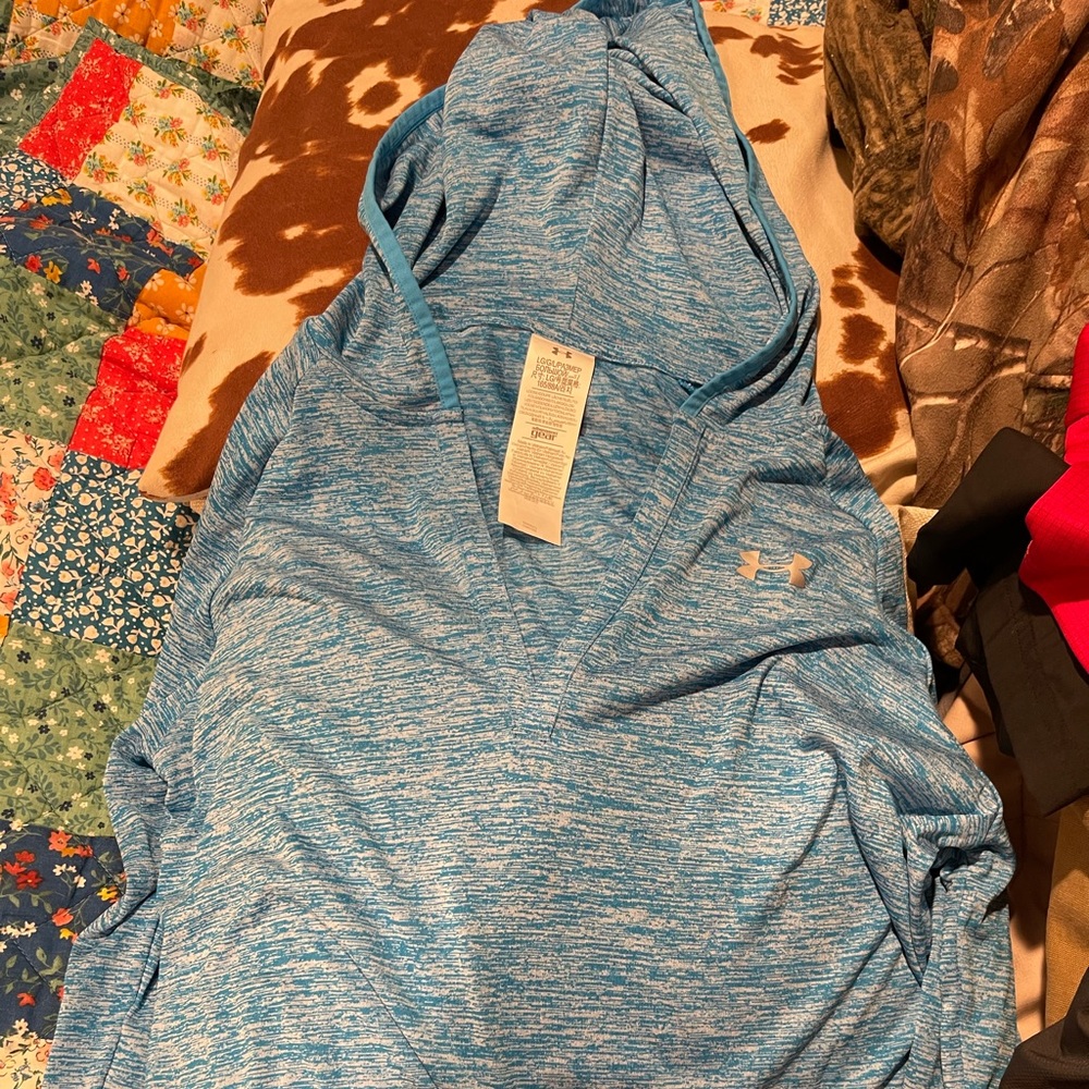 Under Armour long sleeved hooded shirt